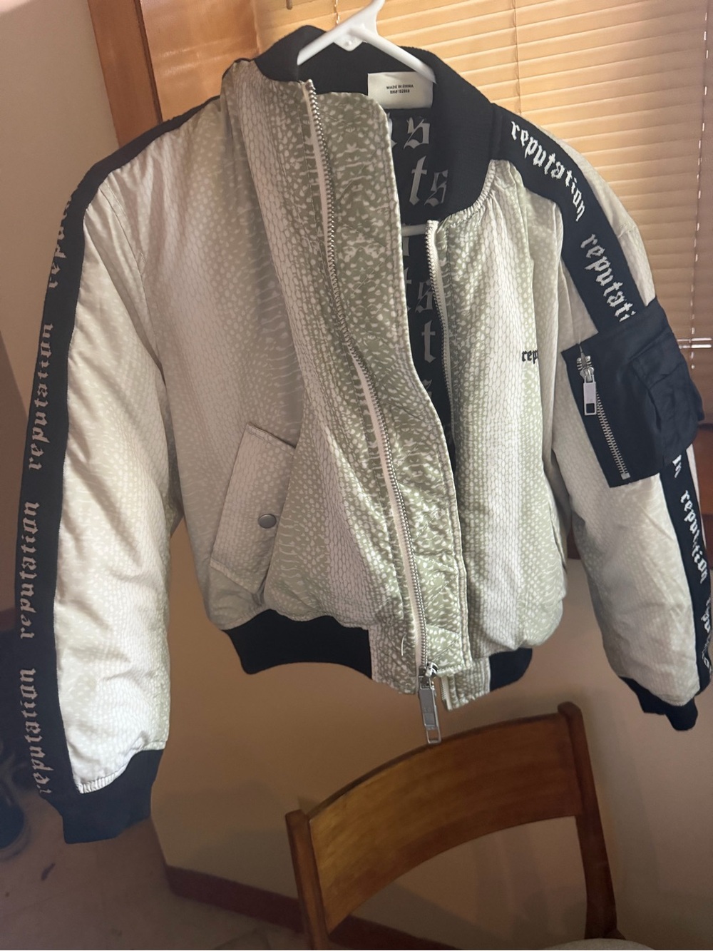 Taylor Swift Metallic Cream and Black Bomber Jacket